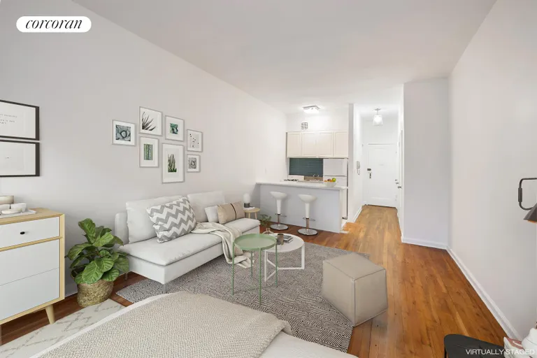 New York City Real Estate | View 444 East 87th Street, 5F | Living Area Staged | View 2