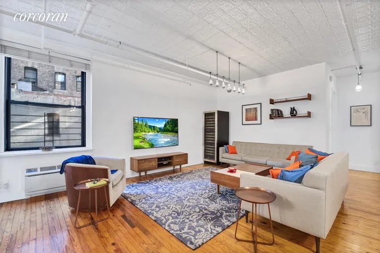 New York City Real Estate | View 133 West 28th Street, 5C | Living Room | View 4