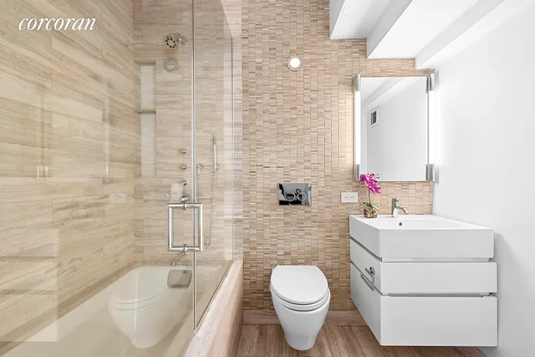 New York City Real Estate | View 421 Hudson Street, 824 | Primary Bathroom | View 4