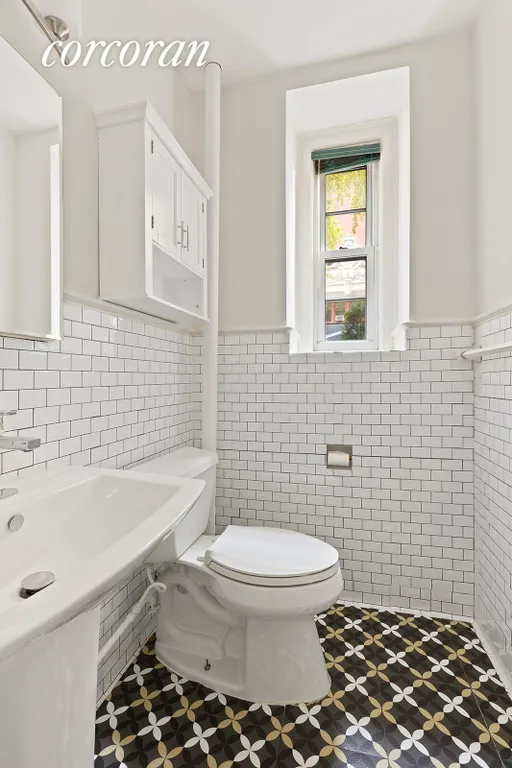 New York City Real Estate | View 160 Henry Street, 1DE | Half Bathroom | View 6