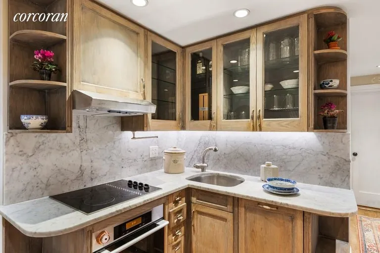 New York City Real Estate | View 170 East 78th Street, 3F | Kitchen with Wood Cabinetry | View 5