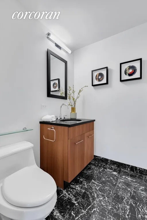 New York City Real Estate | View 11 East 29th Street, 16A | Half Bathroom | View 8