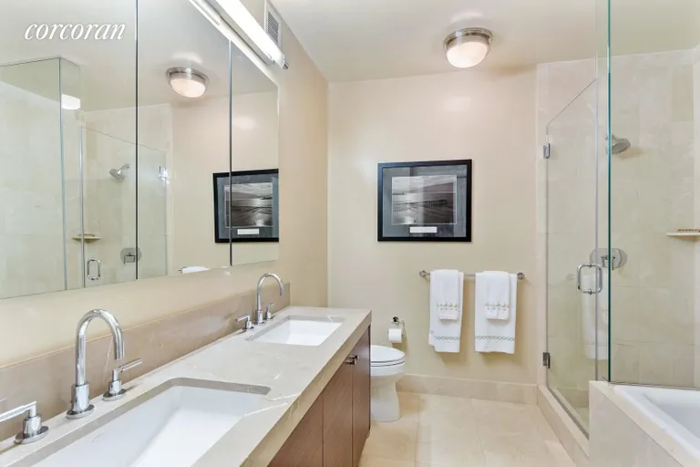 New York City Real Estate | View 30 West Street, 28E | Primary Bathroom | View 7
