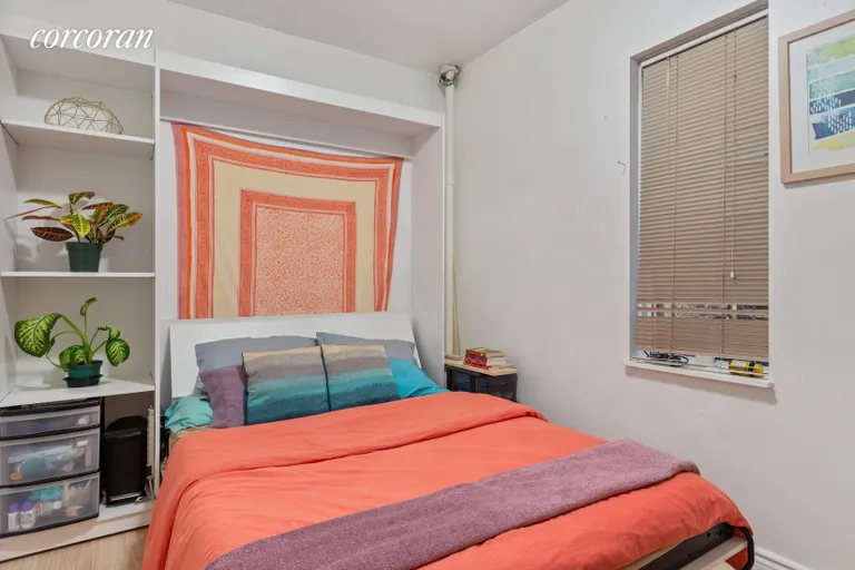 New York City Real Estate | View 353 West 47th Street, 4FE | BR w/ Murphy Bed and shelves | View 4