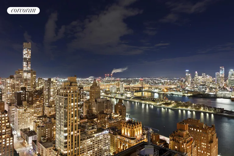 New York City Real Estate | View 100 United Nations Plaza, 43AB | Evening skyline over East River | View 16