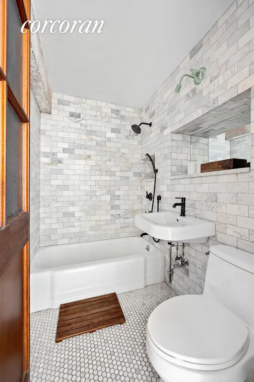 New York City Real Estate | View 185 Hall Street, 1008 | Chic Renovated Bathroom | View 7