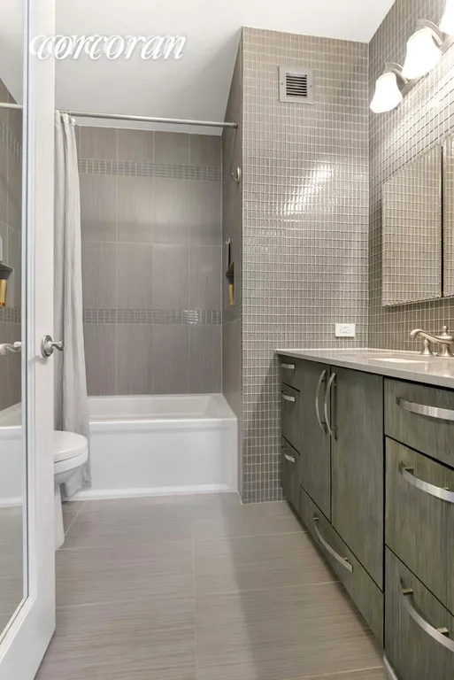 New York City Real Estate | View 303 East 43rd Street, 11C | Primary Bathroom | View 10