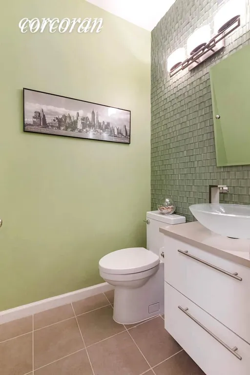 New York City Real Estate | View 303 East 43rd Street, 11C | Half Bathroom | View 12