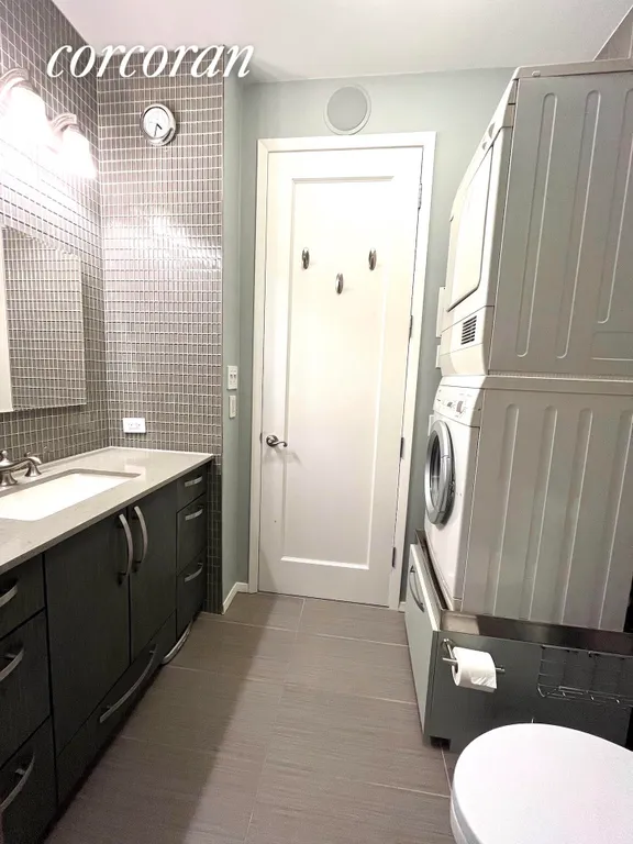 New York City Real Estate | View 303 East 43rd Street, 11C | Primary Bathroom | View 11