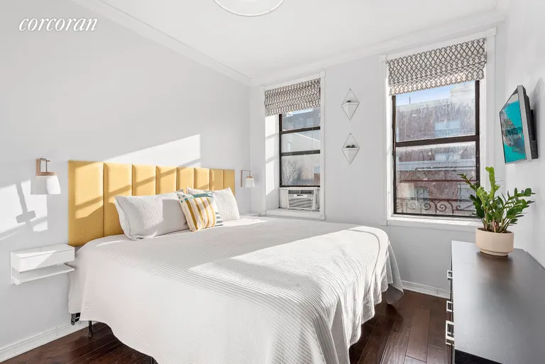 New York City Real Estate | View 311 East 3rd Street, 31 | Sunlit Bedroom | View 2