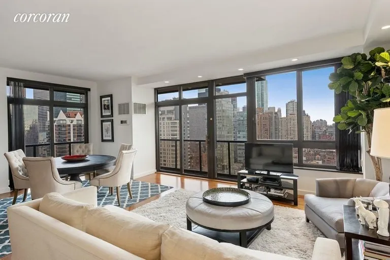 New York City Real Estate | View 100 United Nations Plaza, 29E | Corner living room with balcony | View 2