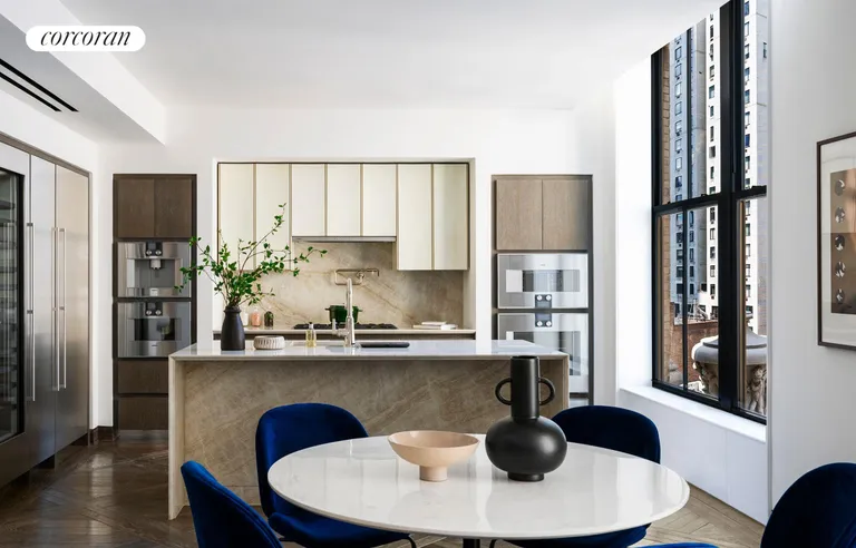 New York City Real Estate | View 111 West 57th Street, 17N | Kitchen and Dining Area | View 2