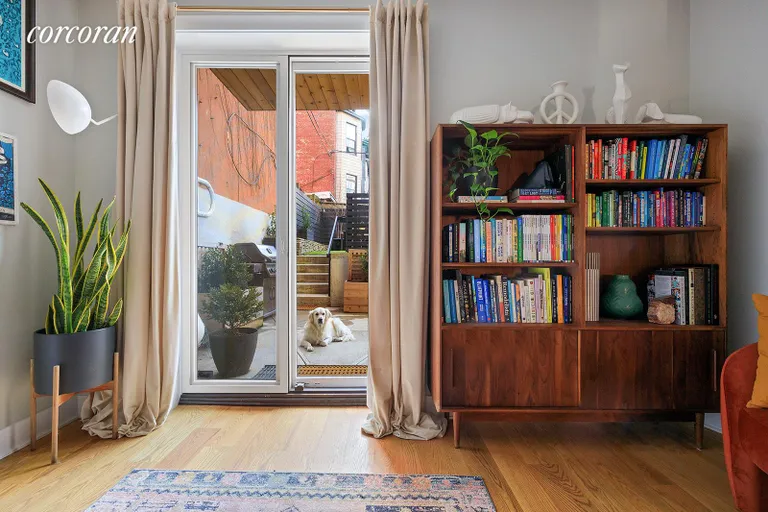 New York City Real Estate | View 476 Washington Avenue, A | Sliding door to the garden | View 2