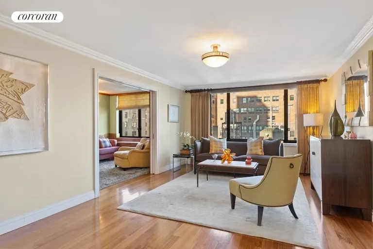 New York City Real Estate | View 115 East 87th Street, 10EF | Living Room & Library | View 2