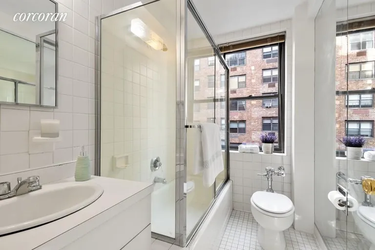 New York City Real Estate | View 230 East 73rd Street, 6B | Windowed Bathroom | View 5