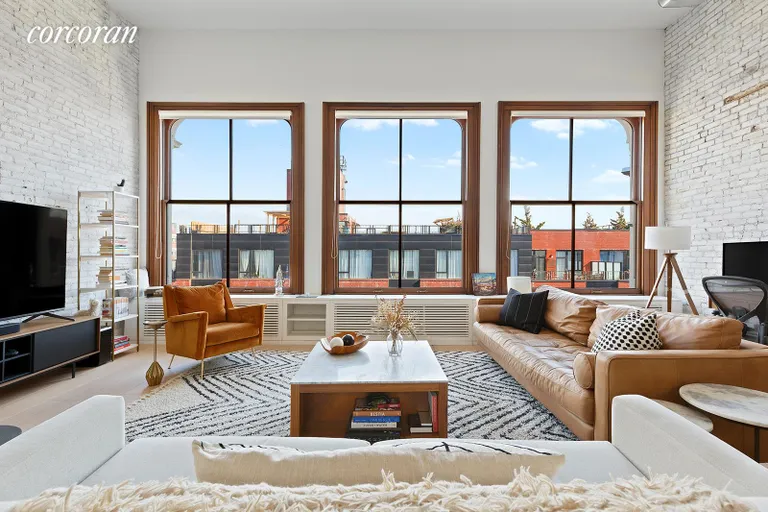 New York City Real Estate | View 705 Driggs Avenue, 16 | Living Room | View 2