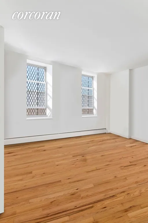 New York City Real Estate | View 204 Hull Street, B | Primary Bedroom w/staged floor | View 2