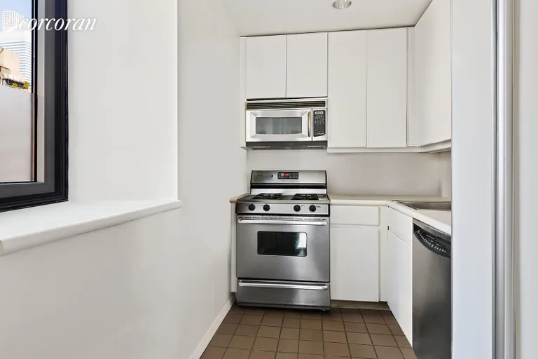 New York City Real Estate | View 100 United Nations Plaza, 14E | Windowed kitchen | View 3