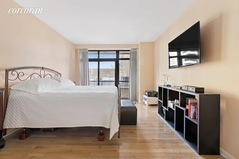 New York City Real Estate | View 100 United Nations Plaza, 14E | Primary bedroom with balcony | View 4
