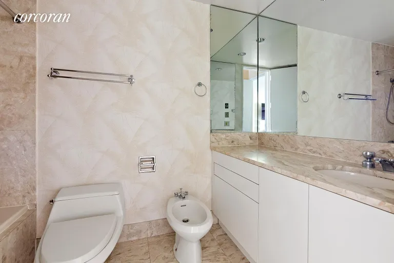 New York City Real Estate | View 100 United Nations Plaza, 14E | En suite marble bathroom | View 5