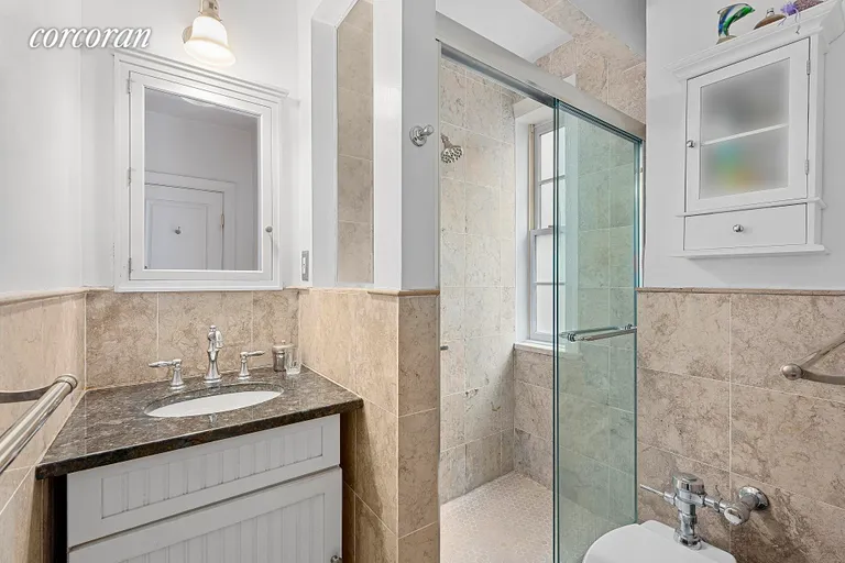 New York City Real Estate | View 35 East 9th Street, 62 | Windowed Bathroom | View 4
