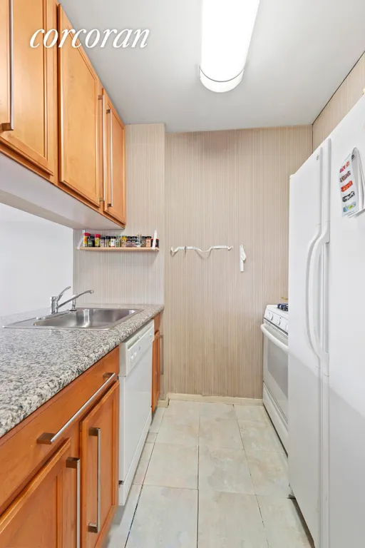 New York City Real Estate | View 393 West 49th Street, 4O | Kitchen | View 3