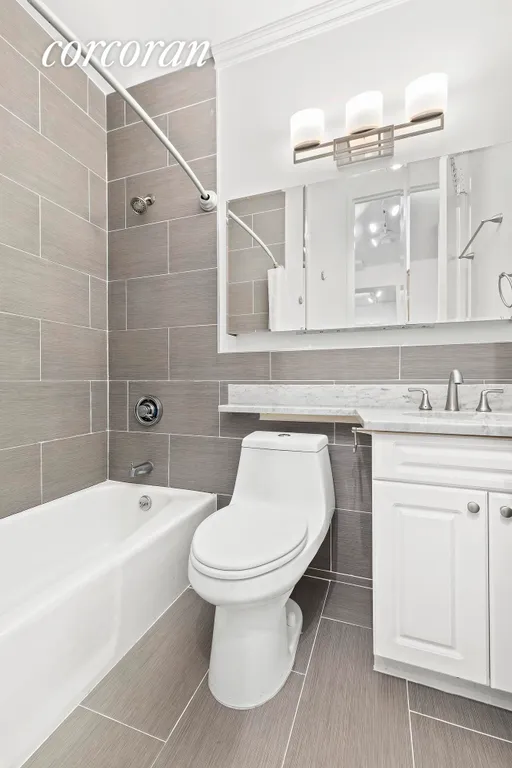 New York City Real Estate | View 393 West 49th Street, 1E | Full Bathroom | View 5