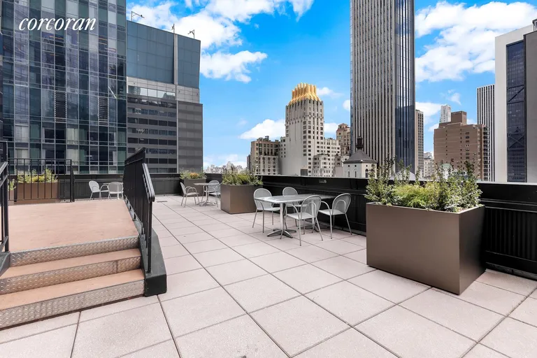New York City Real Estate | View 146 West 57th Street, 48AB | Building Dining Terrace | View 16