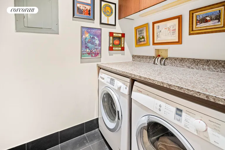 New York City Real Estate | View 15 West 20th Street, 7A | Laundry Room in Apt | View 11
