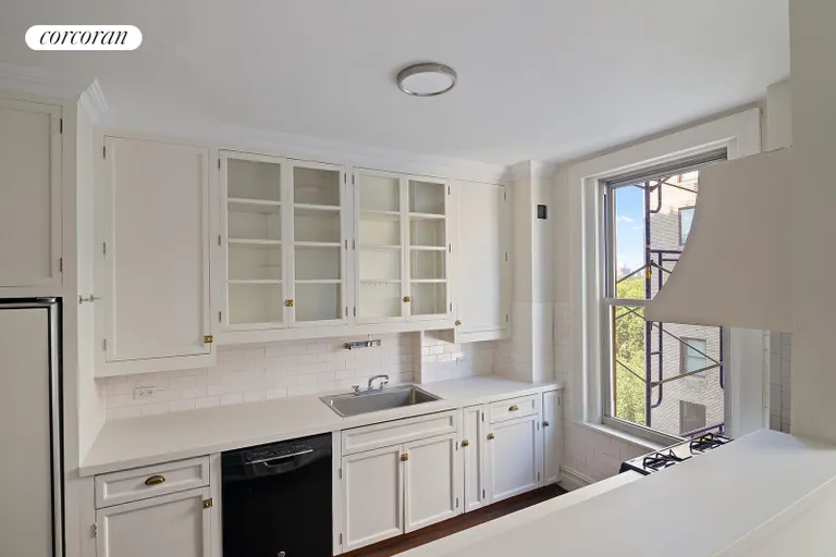 New York City Real Estate | View 1136 Fifth Avenue, 8A | Eat in Kitchen w partial Park view | View 9