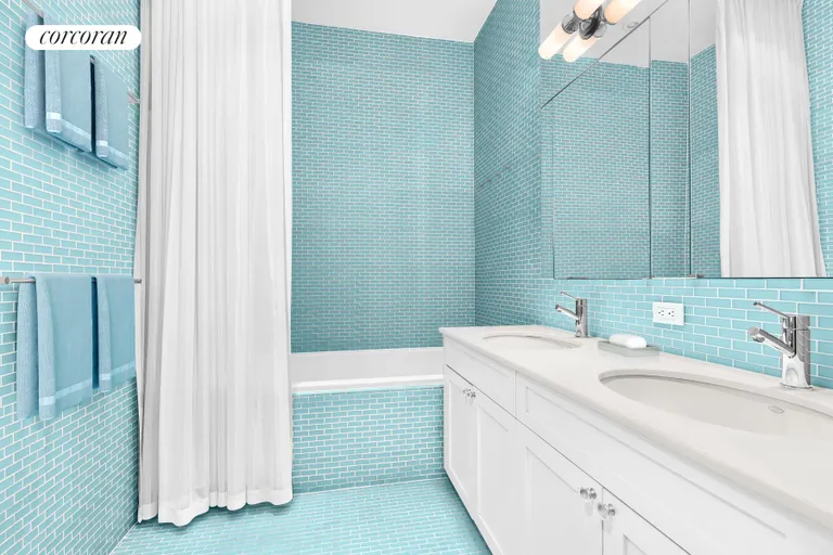 New York City Real Estate | View 139 West 19th Street, 5SW | Beautiful Blue Bathroom! | View 12