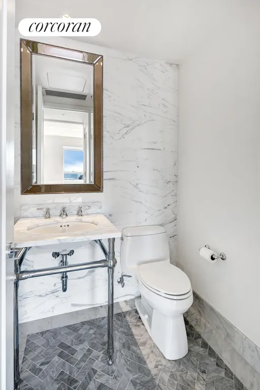 New York City Real Estate | View 200 East 94th Street, PHE | Half Bathroom | View 5