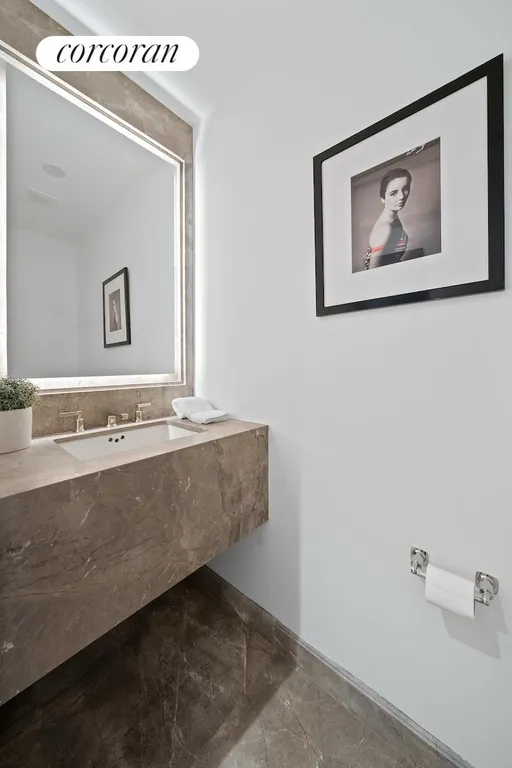 New York City Real Estate | View 40 East 66th Street, 7A | Half Bathroom | View 20