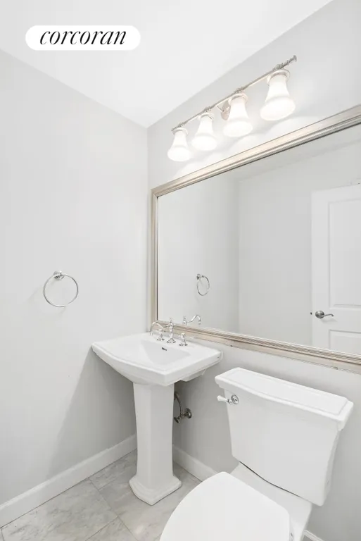 New York City Real Estate | View 112 West 56th Street, 29S | Half Bathroom | View 10