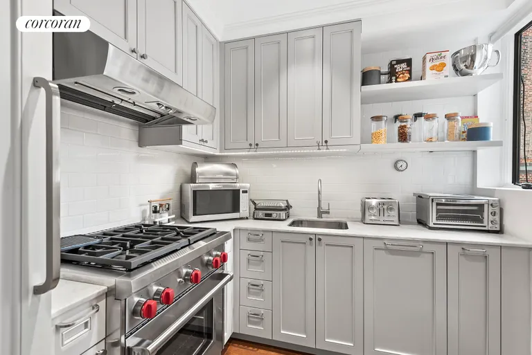 New York City Real Estate | View 444 East 57th Street, 15B | Windowed Kitchen | View 3
