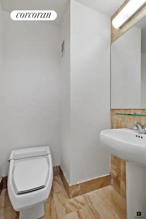 New York City Real Estate | View 160 West 66th Street, 36F | Half Bathroom | View 5