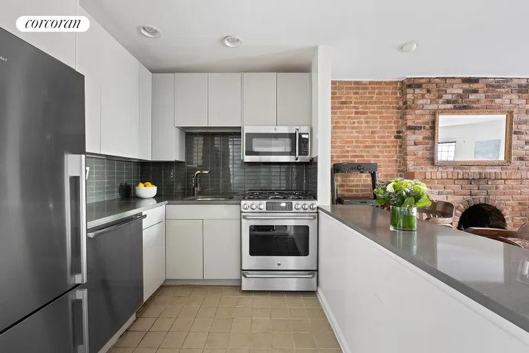 New York City Real Estate | View 35 West 84th Street, GARDEN | Kitchen with Breakfast Bar | View 4