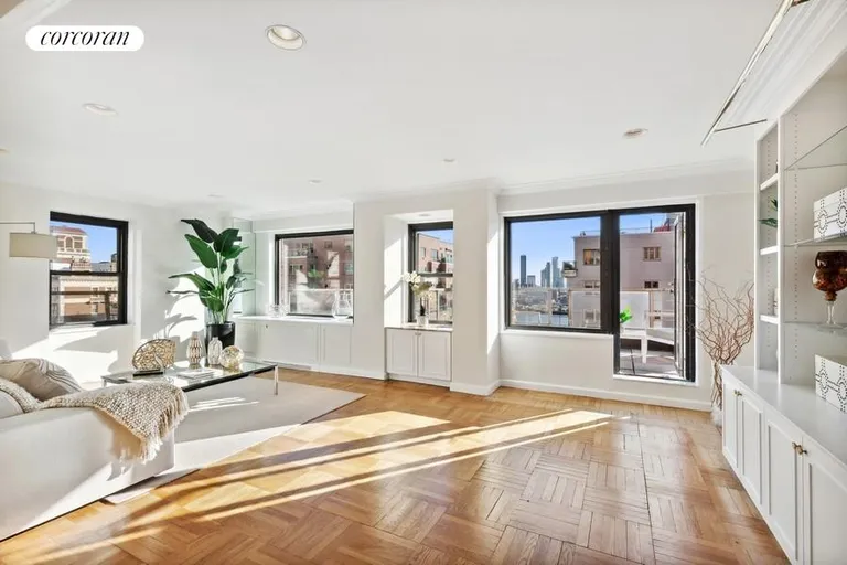 New York City Real Estate | View 50 Sutton Place South, 21F | Sun Flooded Living Room | View 3
