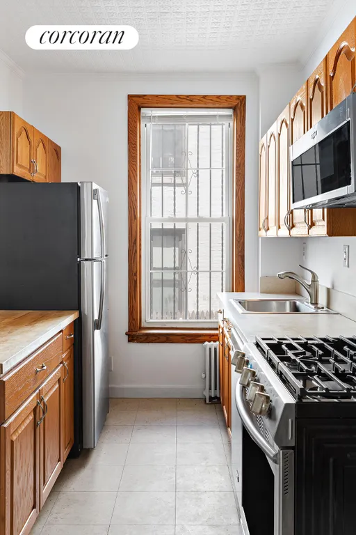 New York City Real Estate | View 462 7th Avenue | Windowed Kitchen | View 14