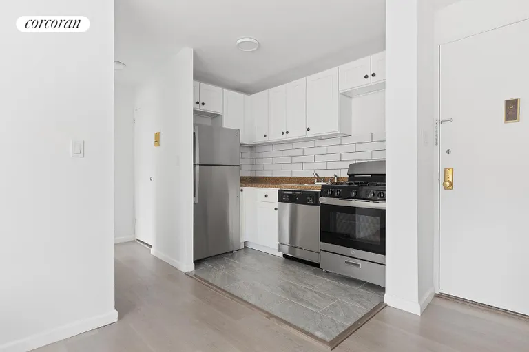 New York City Real Estate | View 353 East 72Nd Street, 15C | Renovated open kitchen | View 5
