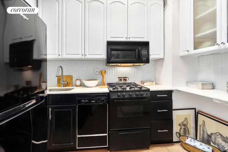 New York City Real Estate | View 12 East 97th Street, 1L | Full Kitchen | View 4