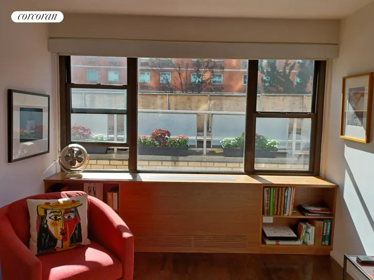 New York City Real Estate | View 115 East 9th Street, 2F | Bedroom windows and flowers | View 10