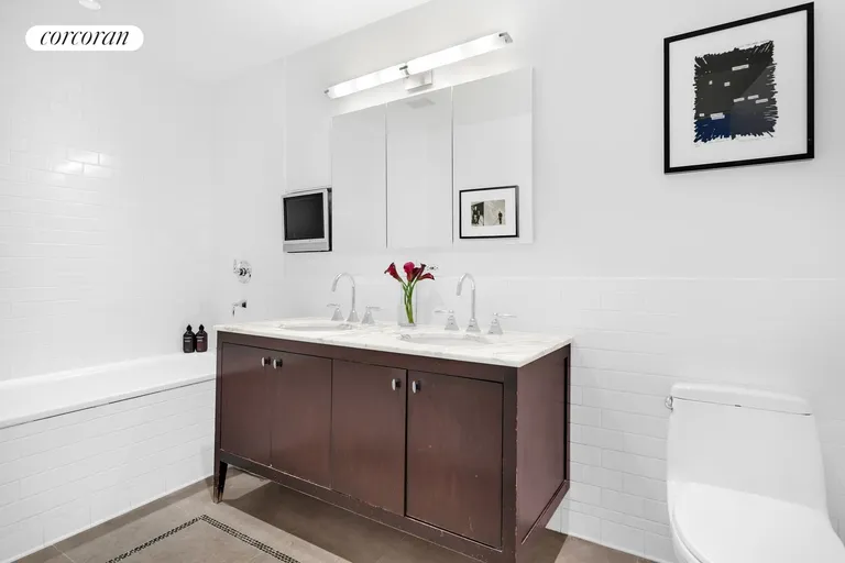 New York City Real Estate | View 201 West 17th Street, 8A | Primary Bathroom | View 9