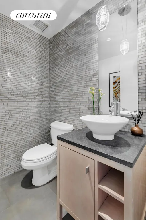 New York City Real Estate | View 201 West 17th Street, 8A | Half Bathroom | View 10