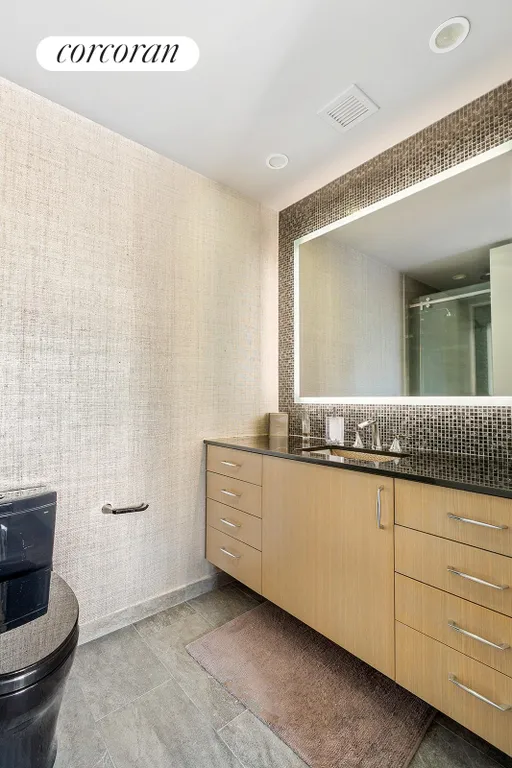 New York City Real Estate | View 100 United Nations Plaza, 23A | Renovated en suite bathroom | View 8