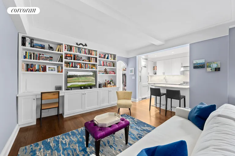 New York City Real Estate | View 308 East 79th Street, 9C | Living Area Built in Shelving | View 3