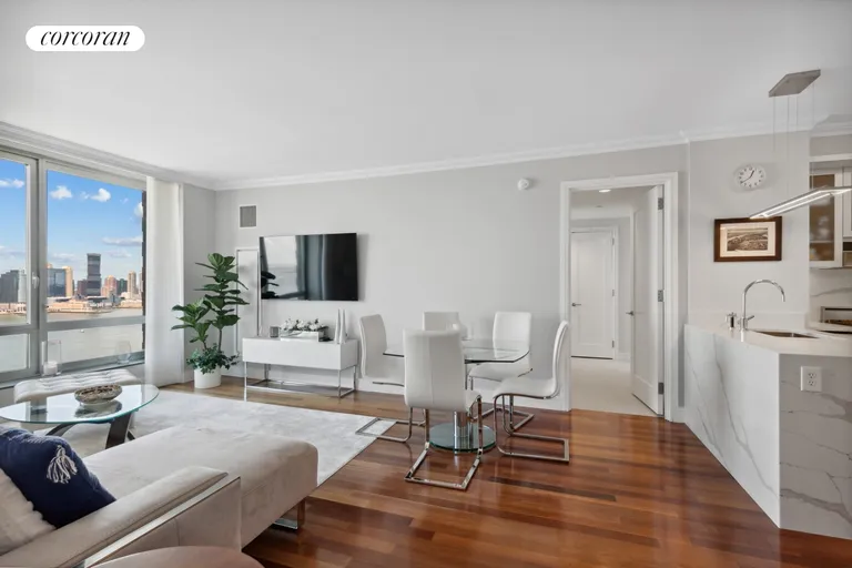 New York City Real Estate | View 30 West Street, 28G | Living Room/Dining Room | View 3