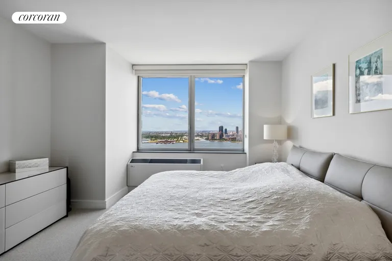 New York City Real Estate | View 30 West Street, 28G | Primary Bedroom | View 5