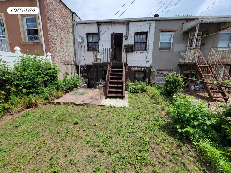 New York City Real Estate | View 1078 East 54th Street | backyard | View 9