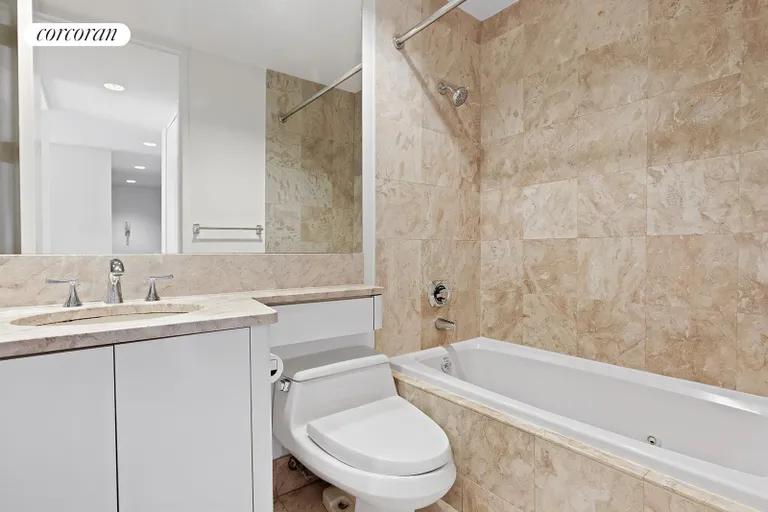 New York City Real Estate | View 100 United Nations Plaza, 11D | Marble bathroom | View 4